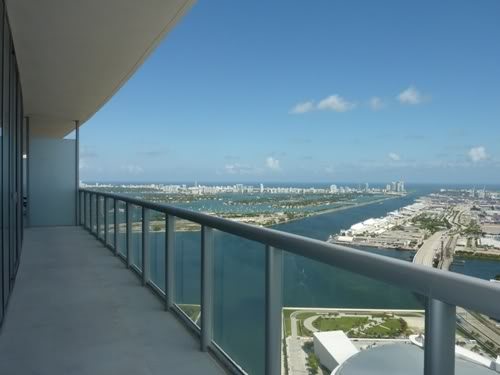 balcony with a direct water view