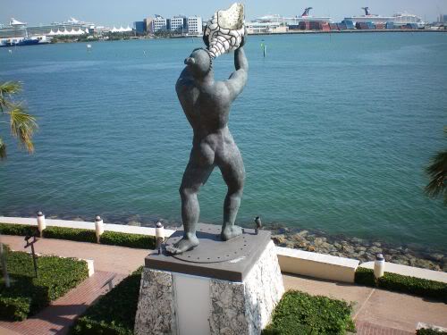 Tequesta Indian blowing conch on Brickell Key