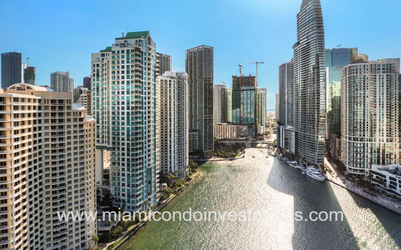 Asia condo building and buildings along waterway