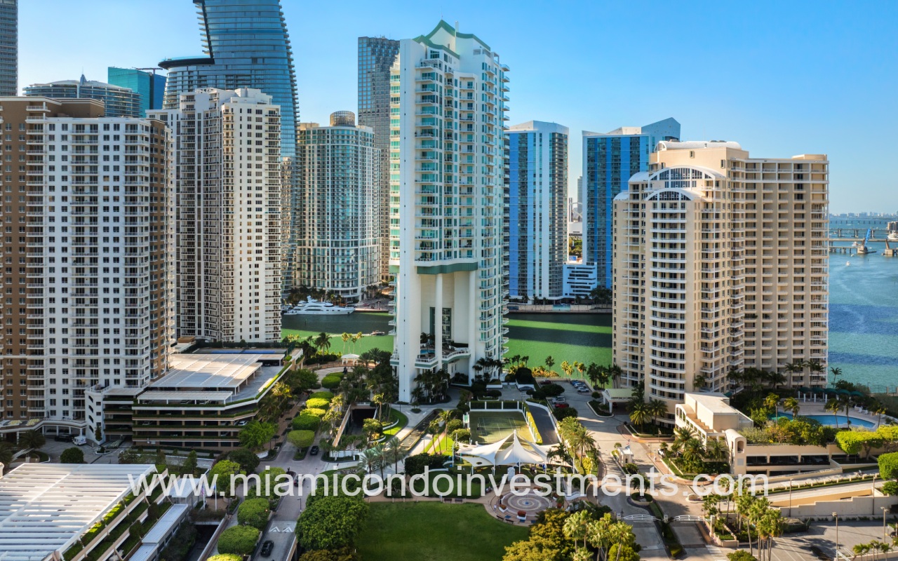 Asia condo drone facing building front and entry