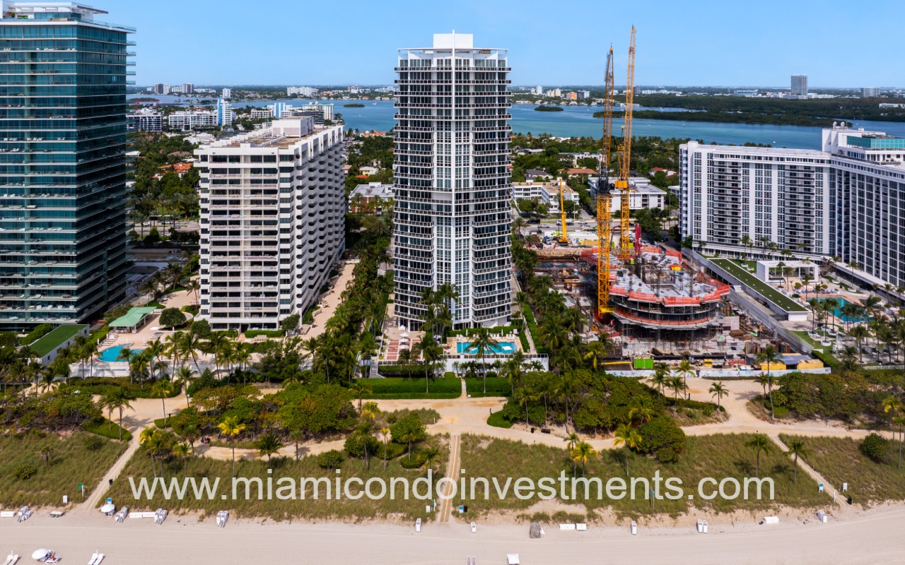 Bellini Bal Harbour drone closeup facing condo building from above the beach shore in the morning