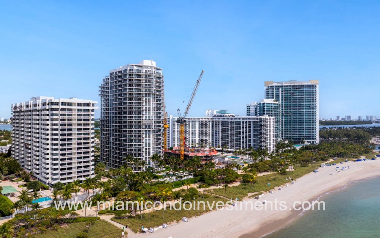 Bellini Bal Harbour drone angle view facing condo building and shoreline in the morning