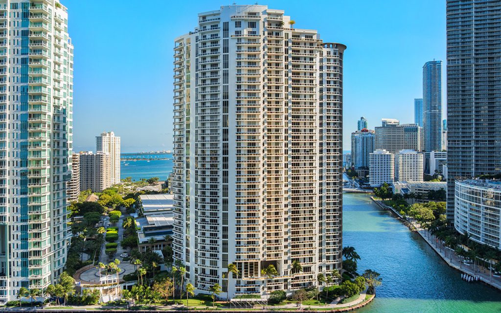 Carbonell full condo building view from across waterway