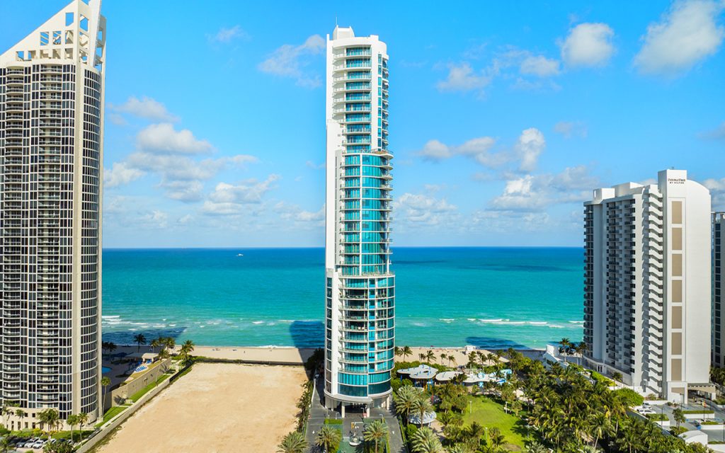Chateau Beach Residences drone directly facing front of condominium building in Sunny Isles Beach