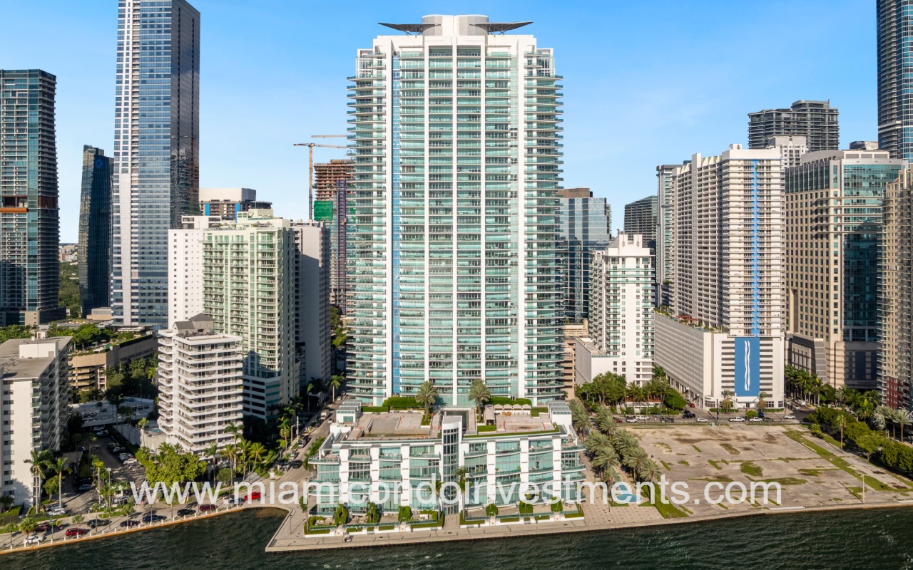 Jade at Brickell drone view directly facing building from above waterway