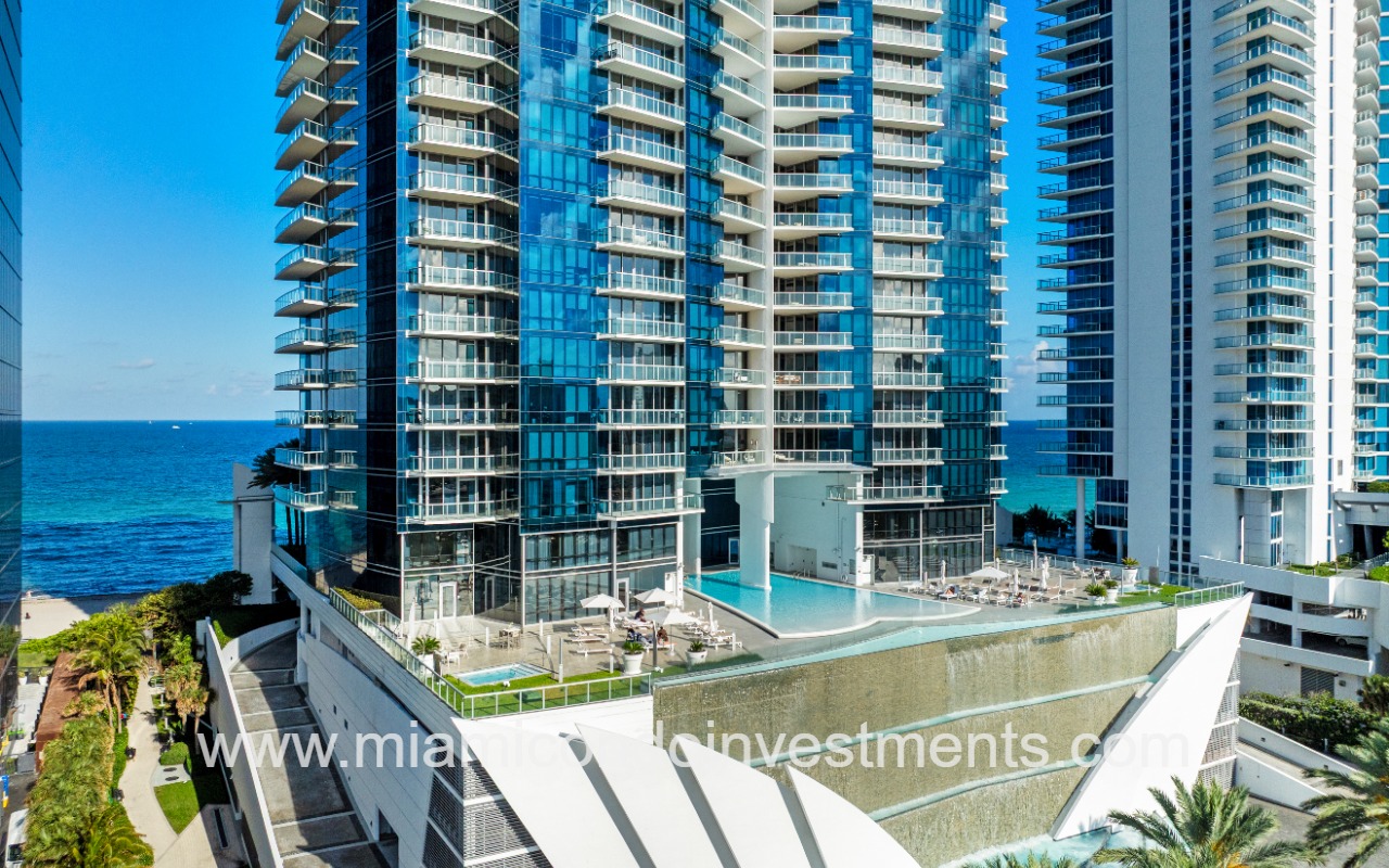 Jade Ocean condos drone of front pool side angle