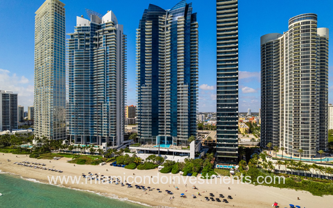 Jade Ocean drone of building and beach