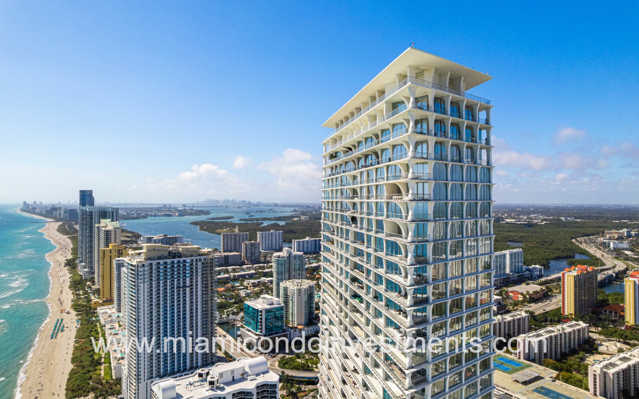 Jade Signature drone of top half angle of building