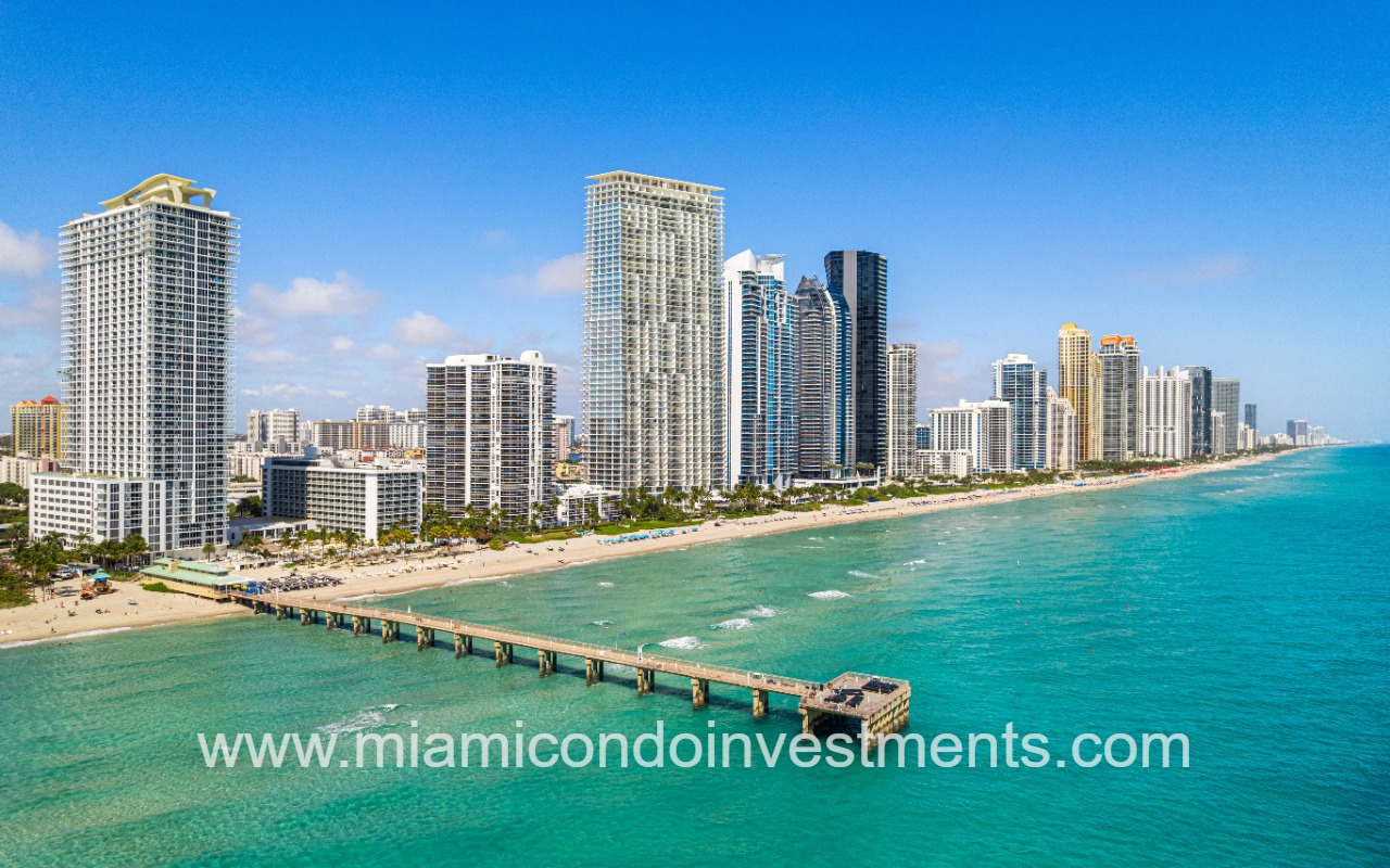 Jade Signature skyline view of condo building on beach shoreline