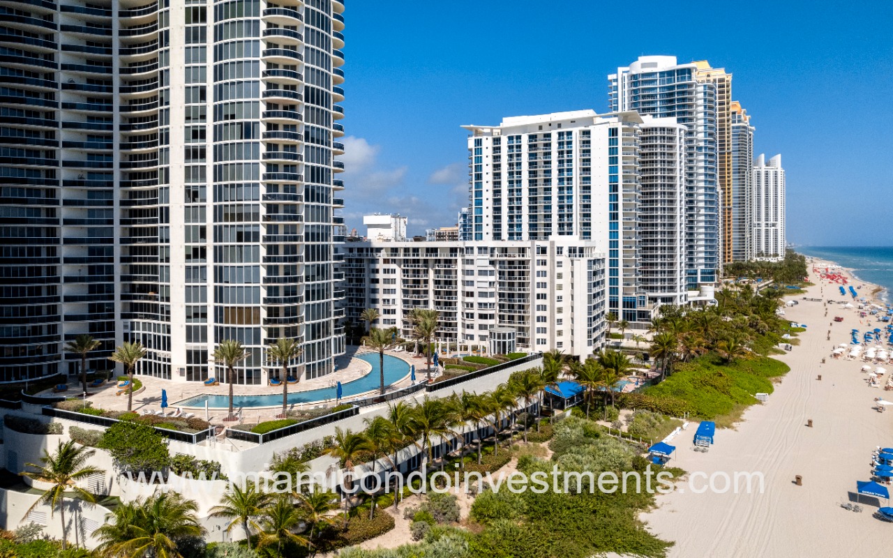 Ocean Four drone of building and beach
