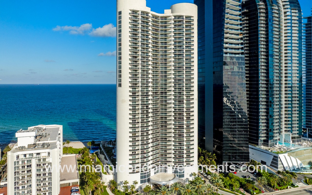 Ocean Four drone facing front angle of building closeup
