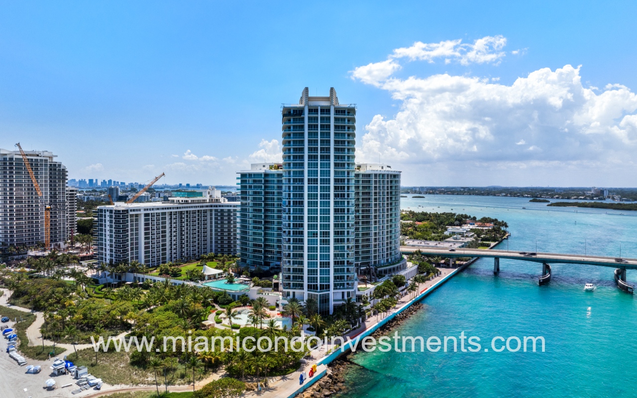 One Bal Harbour drone overlooking condo building from over waterfront