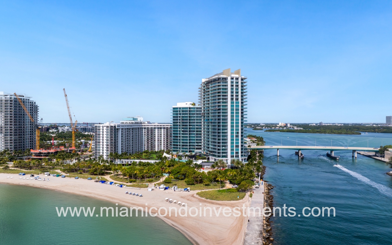 One Bal Harbour drone view facing condo building beach strip and bridge
