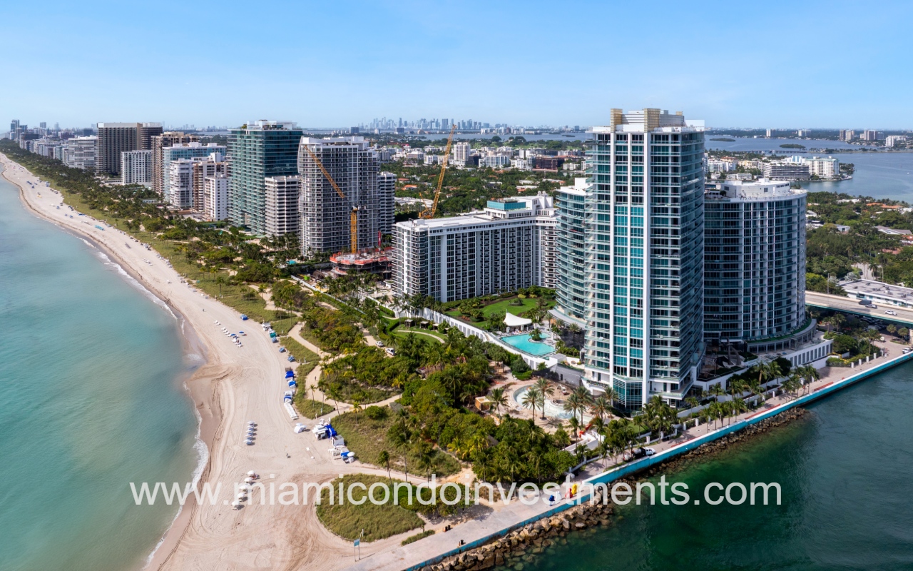 One Bal Harbour condo drone view facing buildings along beach shoreline