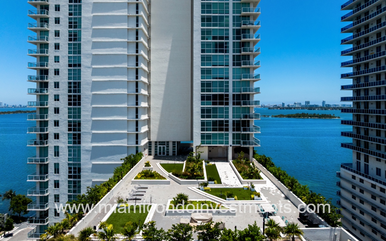 Onyx on the Bay drone closeup view of condo building and outdoor lower rooftop space