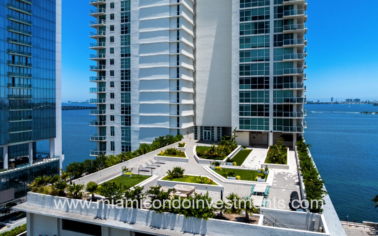 Onyx on the Bay drone view of condo building and outdoor lower rooftop space