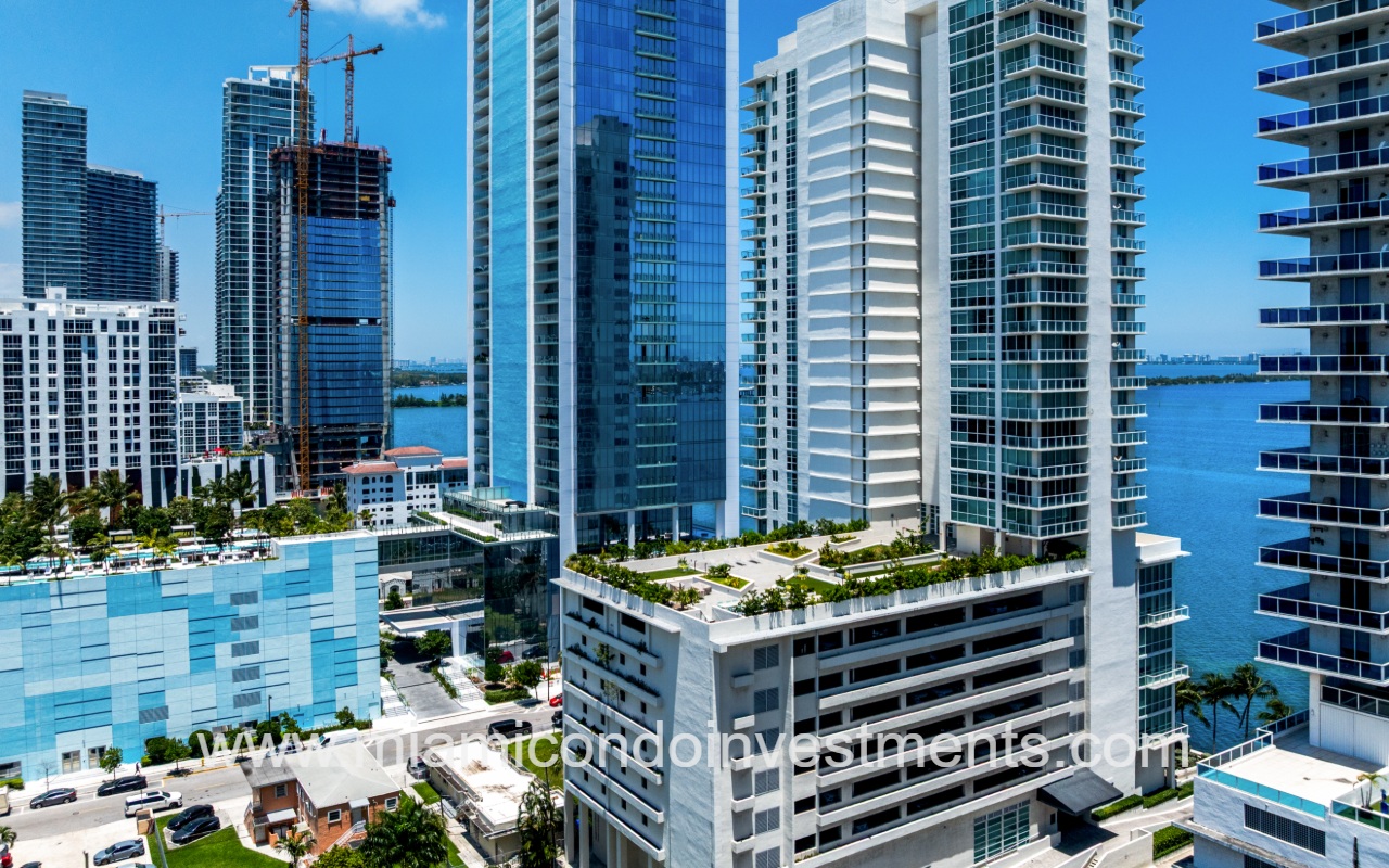 Onyx on the Bay drone view of condo building outdoor lower rooftop space and surrounding area
