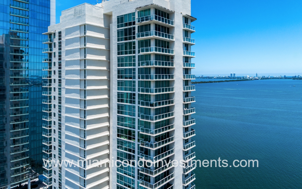 Onyx on the Bay drone view of top half partial side of condo building exterior