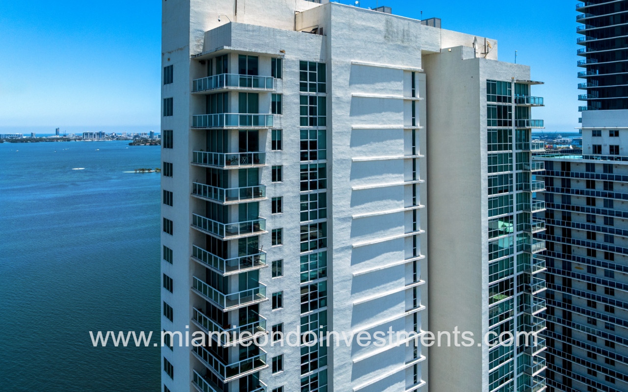 Onyx on the Bay drone of top half of condo building partial exterior view