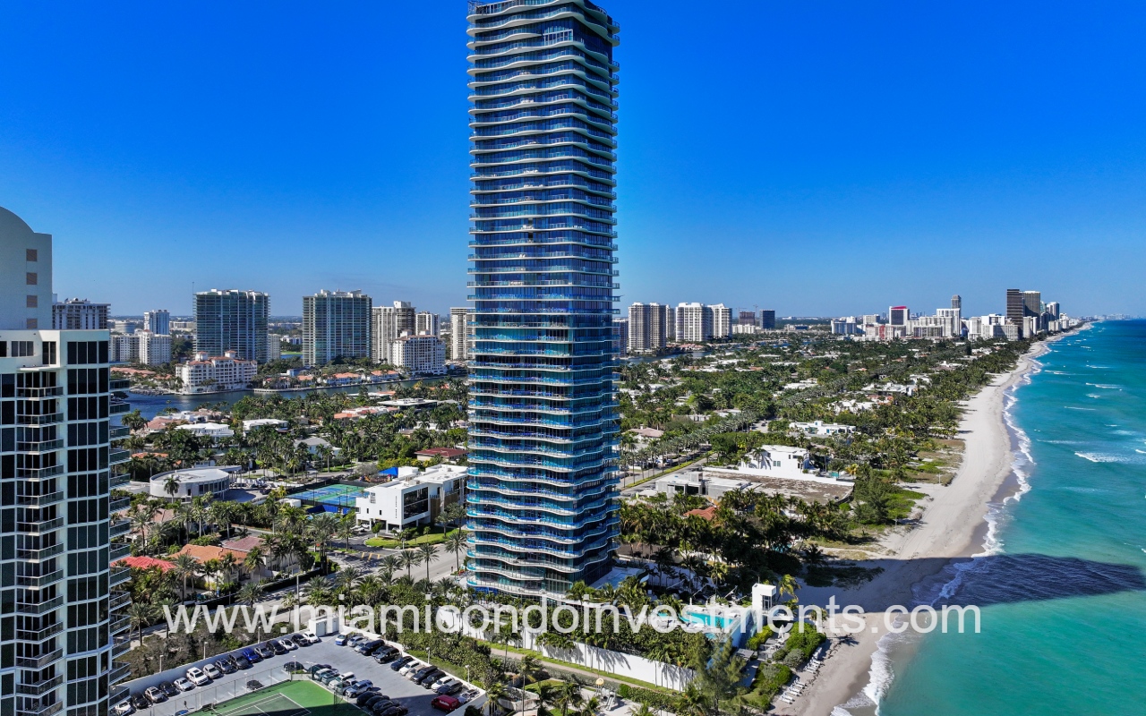 Regalia drone facing angle building exterior with surrounding area in background