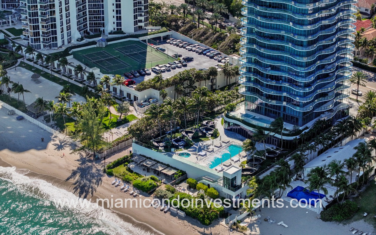 Regalia drone overlooking condo building pool area