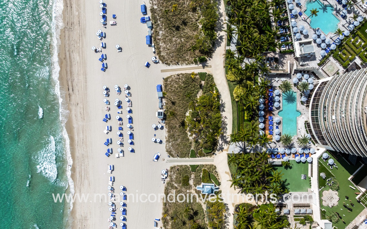 St. Regis Bal Harbour aerial view overlooking pool and beach shoreline