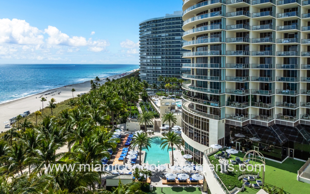 St. Regis Bal Harbour condo building profile view with pool and ocean view