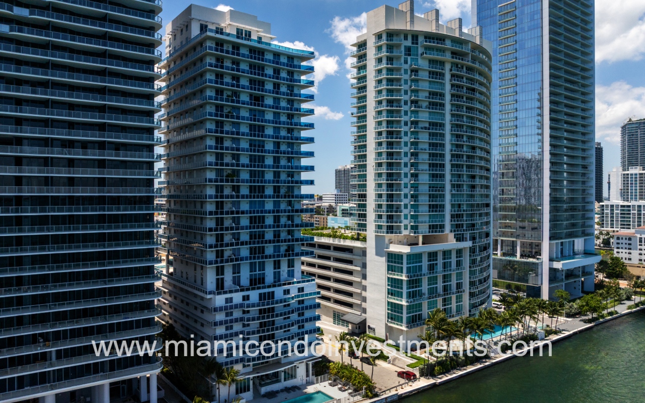 Star Lofts drone angle facing condo building from above the waterway