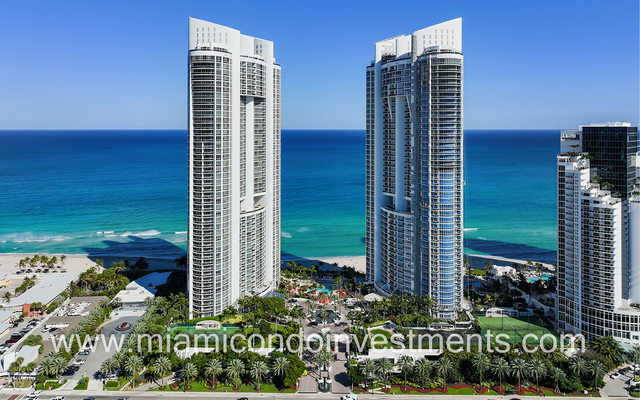 Trump Palace drone facing building with ocean backdrop