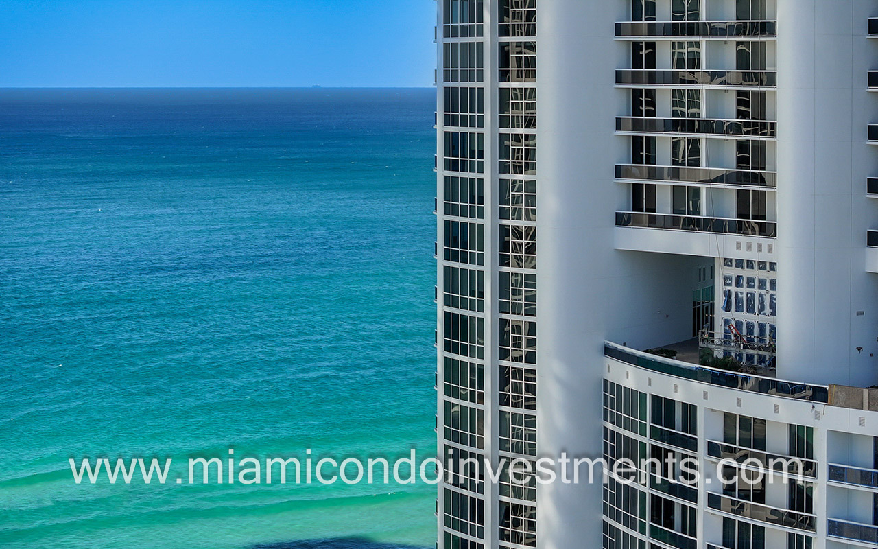 Trump palace side view of building and ocean closeup