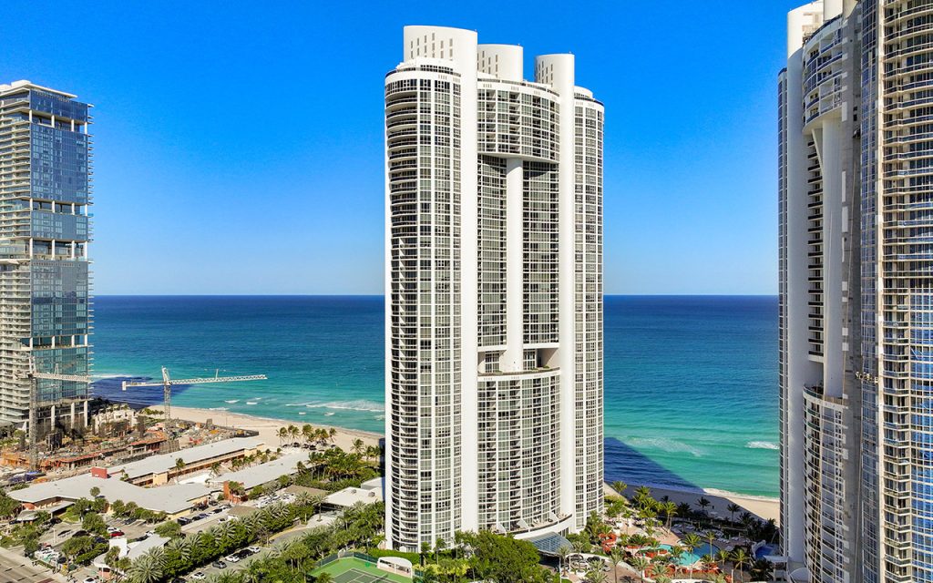 Trump Royale condo building with ocean backdrop
