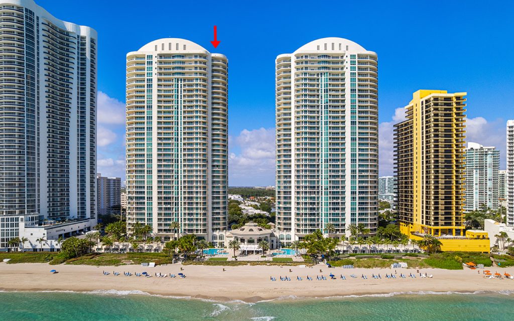 Turnberry Ocean Colony South drone view directly facing condo building from the ocean