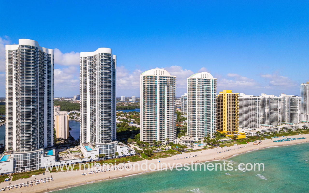 Turnberry Ocean Colony South drone facing condo building and condo buildings on ocean