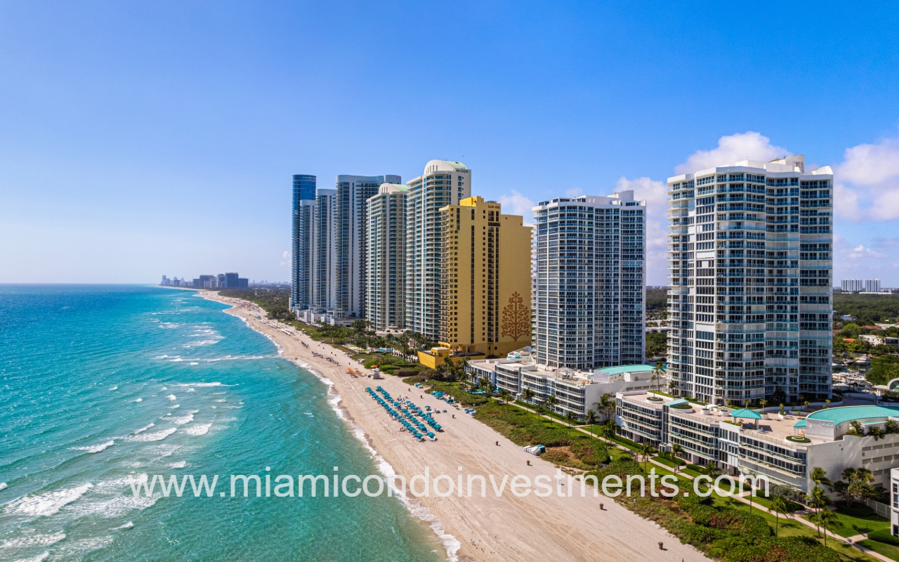 Turnberry Ocean Colony South drone southward facing with condo buildings along beach