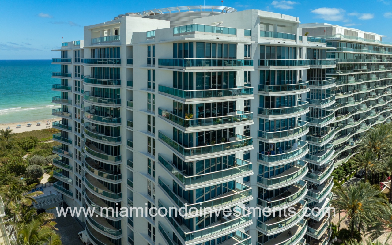 Azure drone closeup facing top condo building exterior