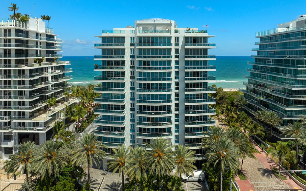 Azure drone view directly facing condo building