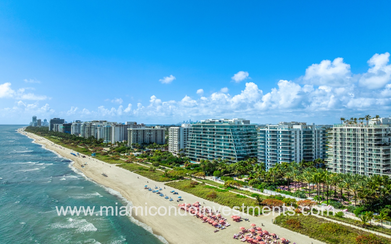 Azure drone angle view of condo building from over the water