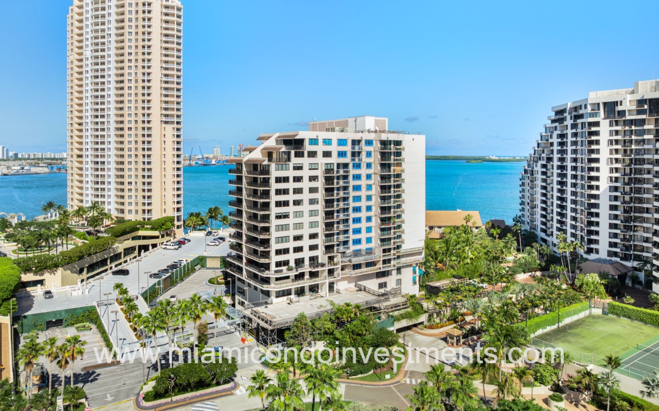 Brickell Key Two drone facing side of condo building and waterfront backdrop