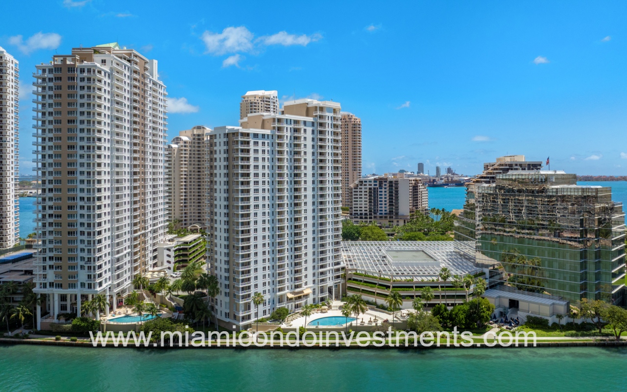 Courvoisier Courts drone view of building from across waterway