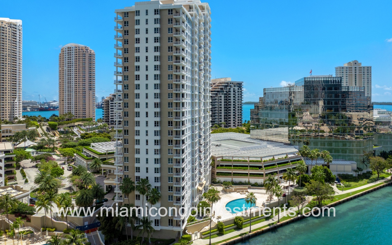 Courvoisier Courts drone view of building along waterway closeup