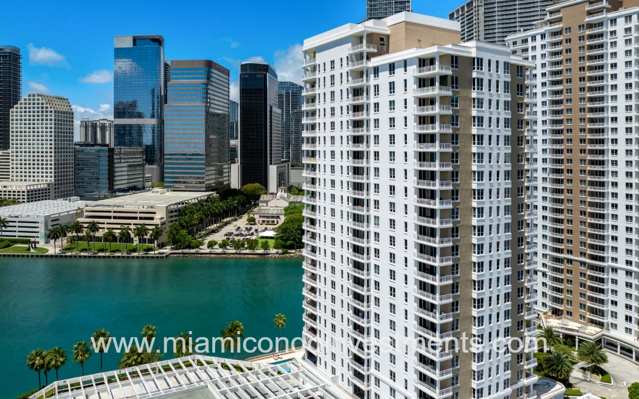 Courvoisier Courts drone facing building front side angle and waterfront