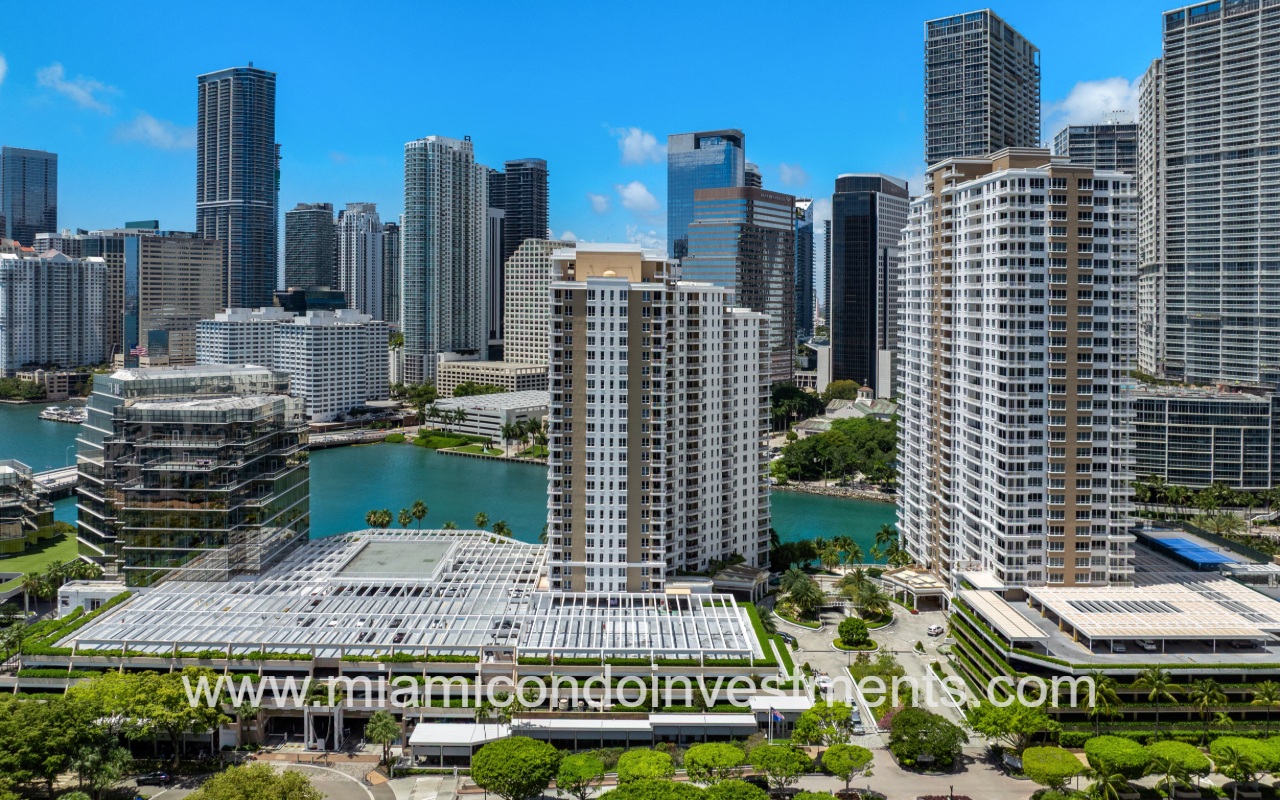 Courvoisier Courts drone facing front of building with waterway backdrop