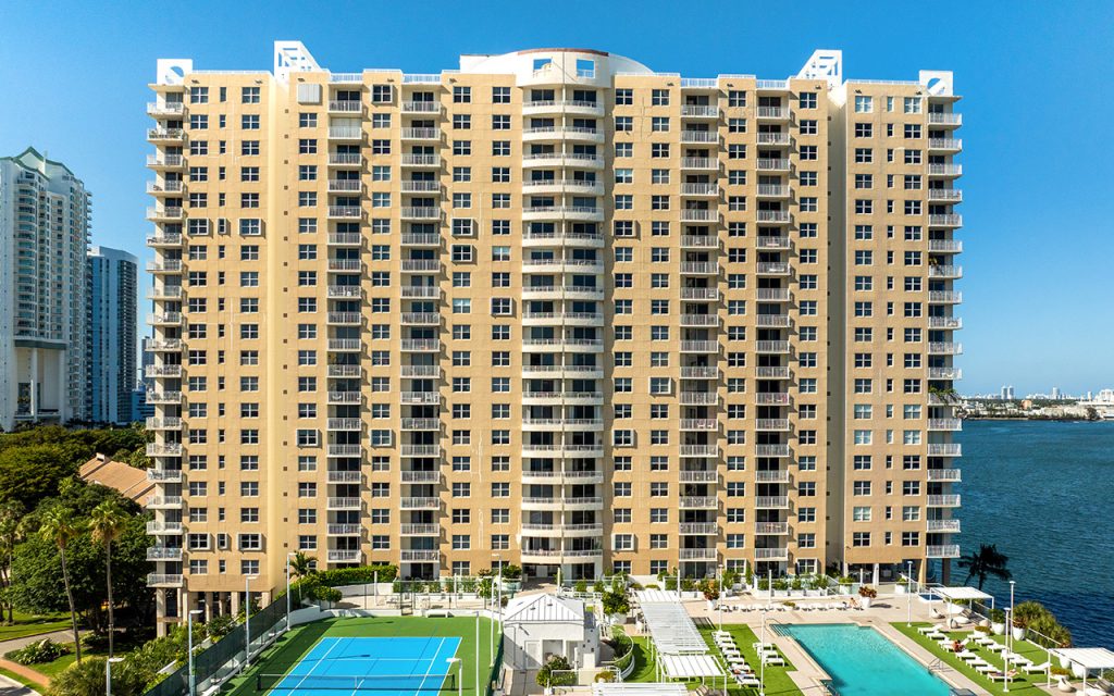 Isola drone closeup view directly facing building and amenities
