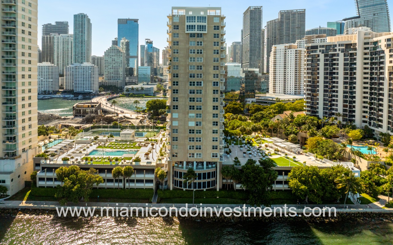 Isola drone direct view of condo building on waterway