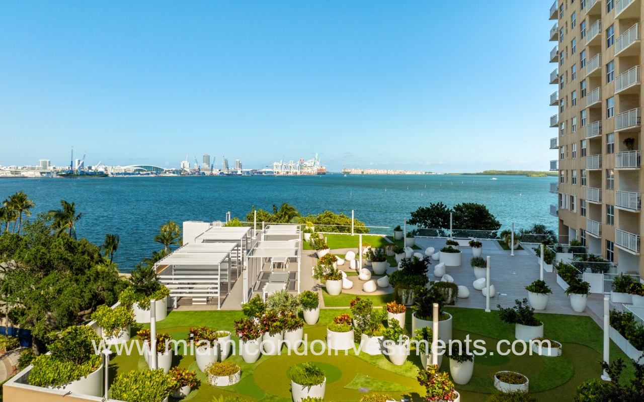 Isola drone closeup view of building deck area overlooking Biscayne Bay