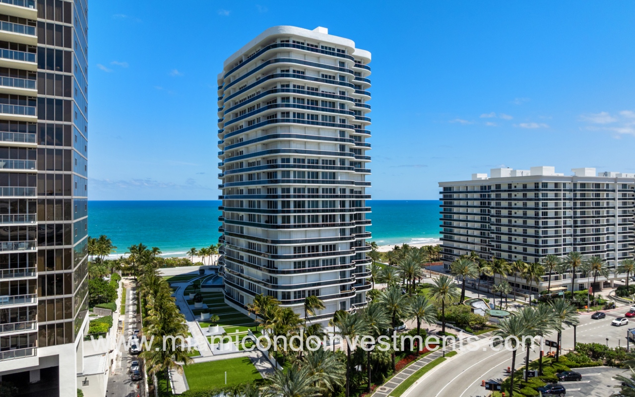 Majestic Tower drone closeup view of condo building with blue ocean backdrop