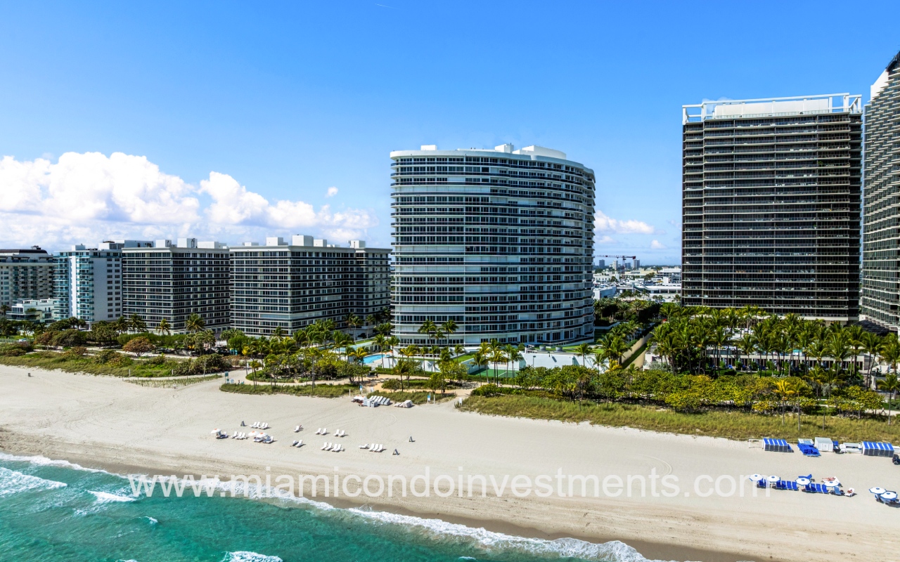 Majestic Tower drone facing condo building from over the ocean in the morning