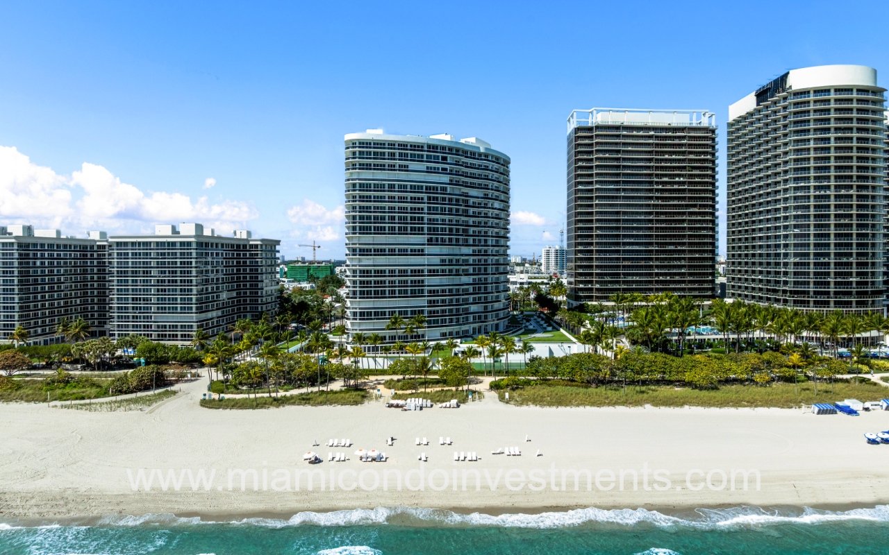 Majestic Tower drone of condo building from over the ocean in the morning