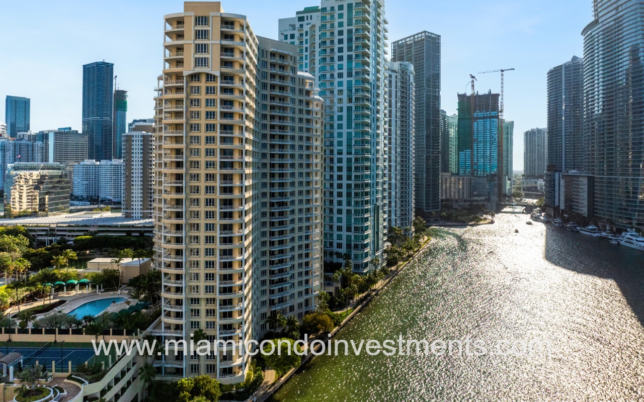One Tequesta Point drone of condo building and buildings along waterway