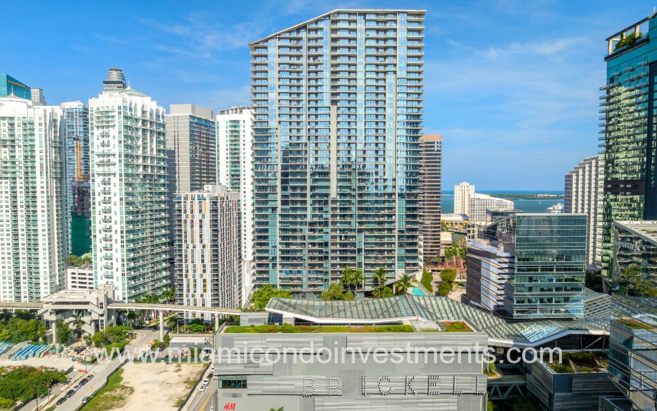 Street-level architectural facade of Reach Brickell City Centre condominium tower building